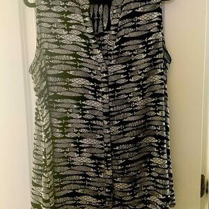 Beautiful lightweight summer top. Like new condition.